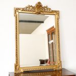 Wall mirror in gilded wood with torchon columns, 19th century - Wall Mirrors Wall mirror in gilded wood with torchon columns, 19th century - Wall Mirrors