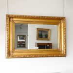 Wall mirror in gilded wood with vase on coping, France, Louis XVI - Wall Mirrors Wall mirror in gilded wood with vase on coping, France, Louis XVI - Wall Mirrors