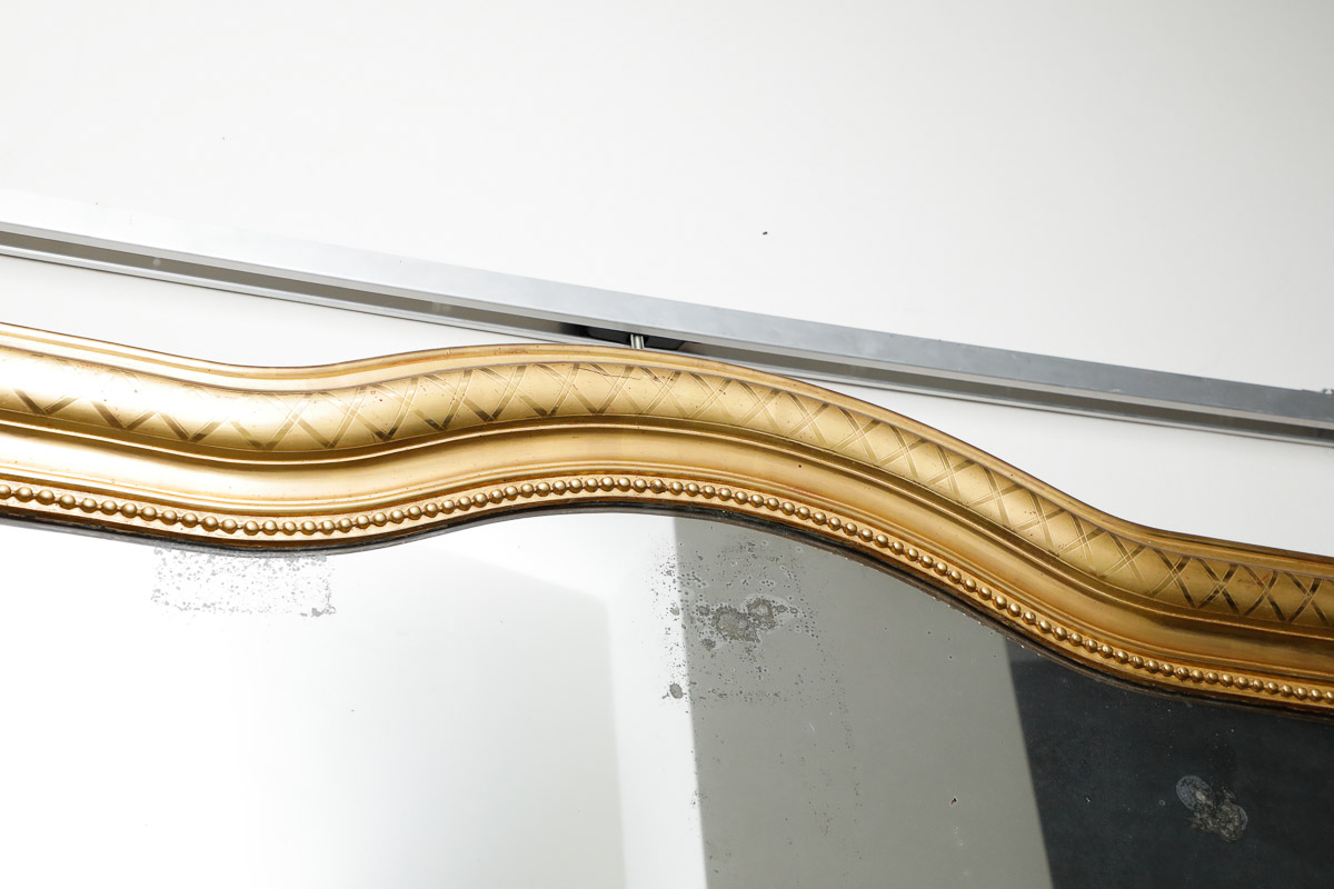 Wall mirror in gilded wood with serpentine coping, Louis Philippe - Wall Mirrors Wall mirror in gilded wood with serpentine coping, Louis Philippe - Wall Mirrors