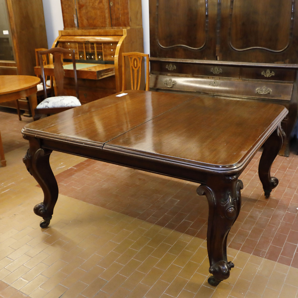 Wind-out table in mahogany, Victorian era - Tables and Desks Wind-out table in mahogany, Victorian era - Tables and Desks